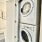 stacked washer/dryer units in laundry closet