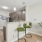 kitchen area with a bar and bar stools