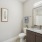 bathroom with a large mirror