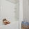 bathroom with a bathtub and woven basket in the corner
